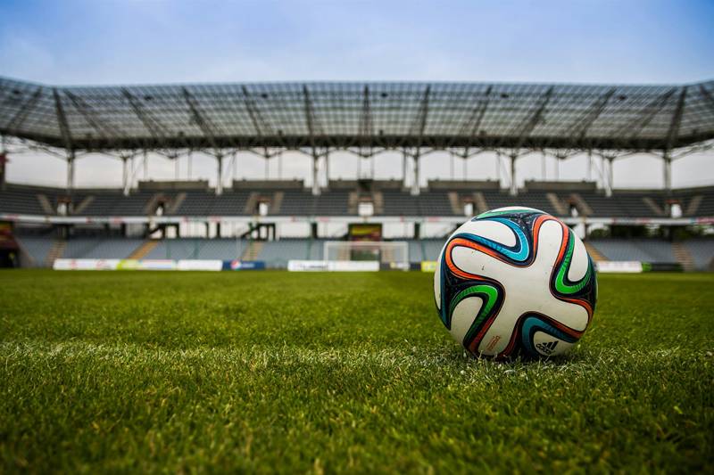 Football pitch with a ball on it